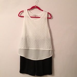 Sleeveless overlain high/low top